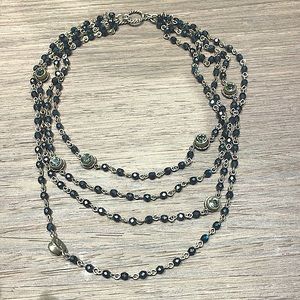 Virgin Angels & Saints beaded women’s necklace New Without tags, tin included.